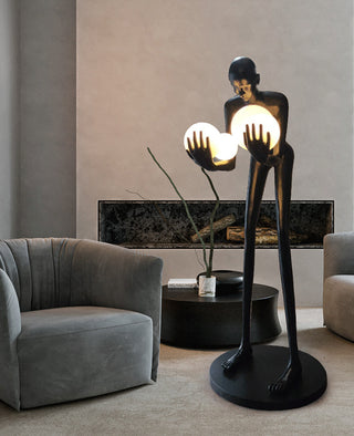 Figure Holding Ball Sculpture Floor Lamp