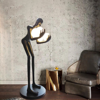Figure Holding Ball Sculpture Floor Lamp