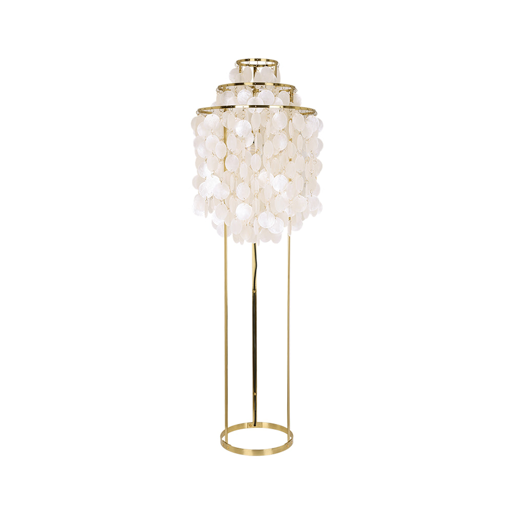 Vintage shell floor lamp with a hanging shell shade on a gold metal stand.